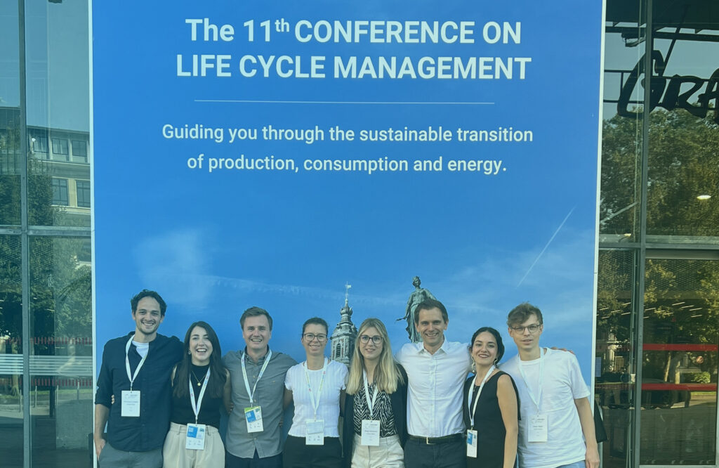 Group of people on a conference smiling