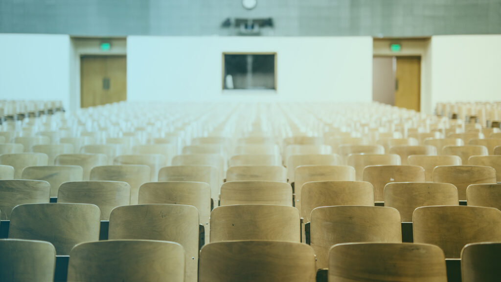 An auditorium with empty seats